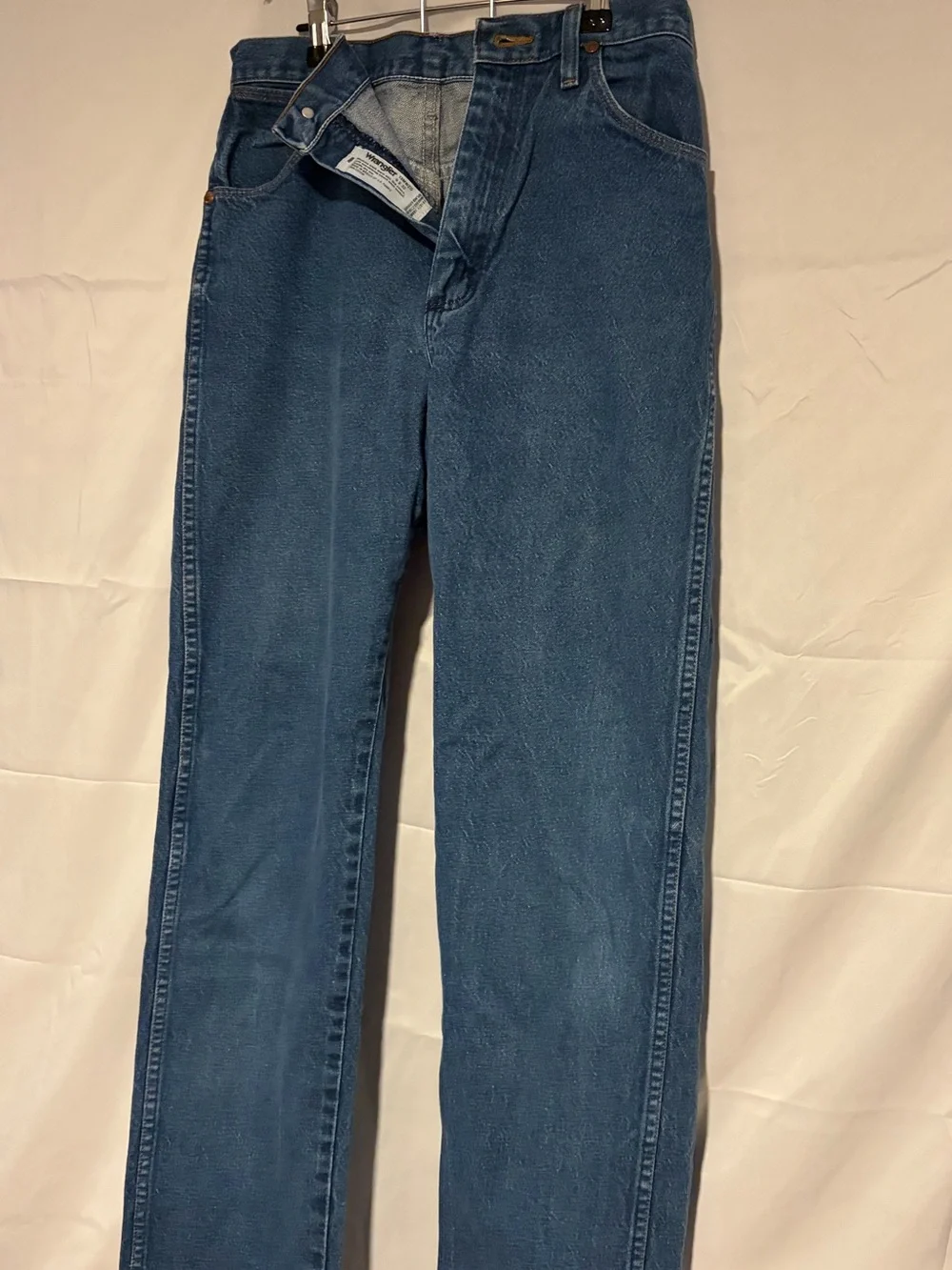 Wrangler Relaxed Fit Denim Jeans in Medium Blue with Orange Stitching